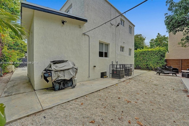 rear view of property with a patio