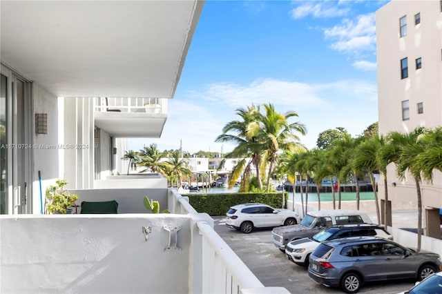 balcony featuring a water view