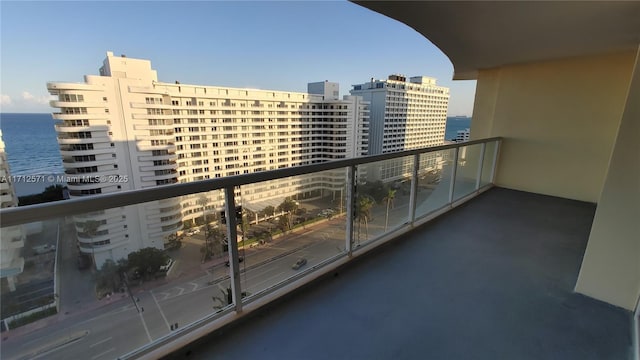 balcony with a city view and a water view