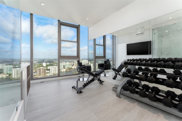 gym featuring floor to ceiling windows