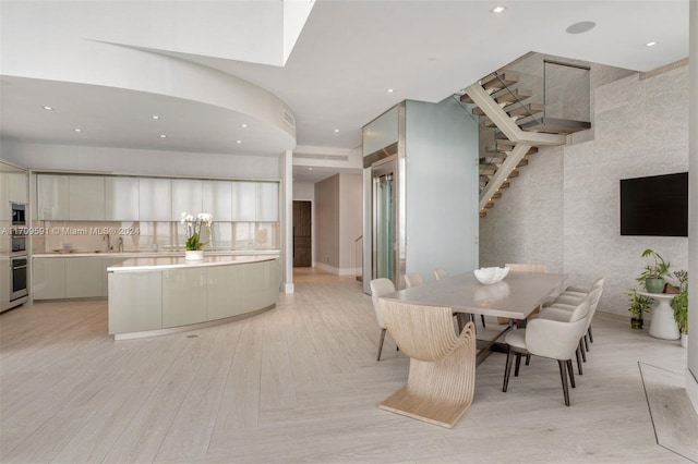 dining room with light wood-type flooring