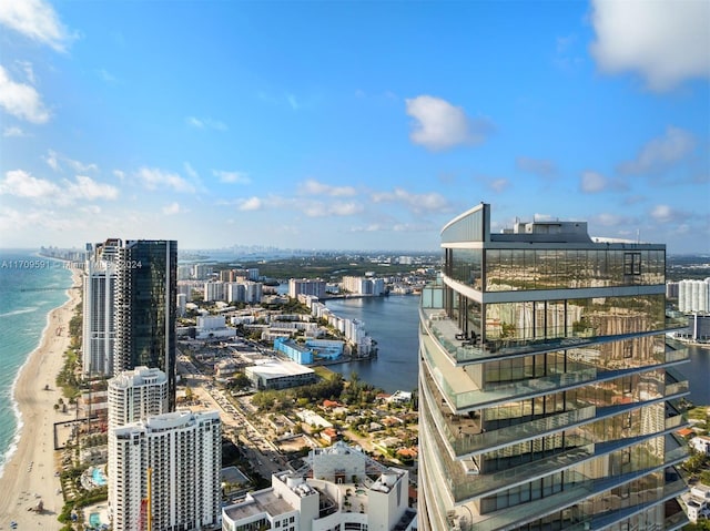 view of city with a water view and a view of the beach