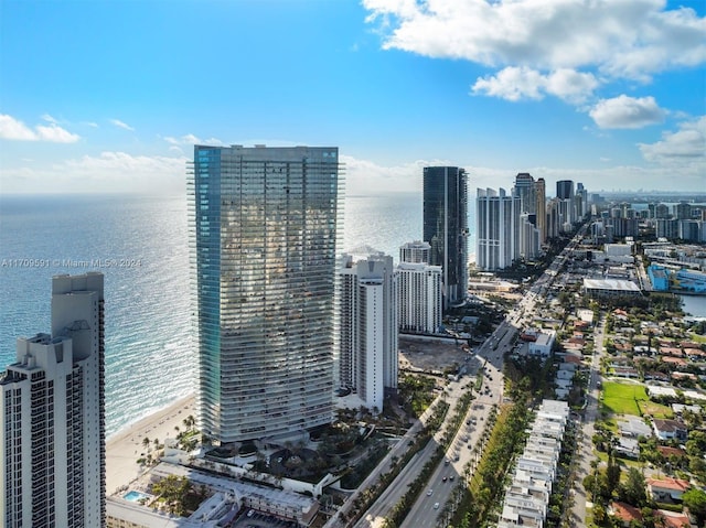 property's view of city with a water view and a view of the beach