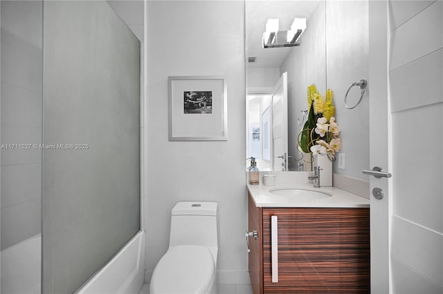 full bathroom with vanity, toilet, and bath / shower combo with glass door