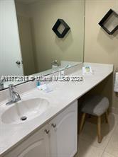 bathroom featuring tile patterned flooring and vanity