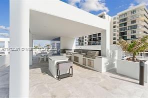 view of patio / terrace featuring an outdoor kitchen