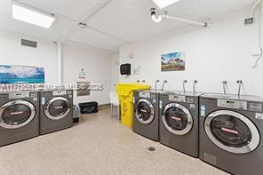 laundry room with washer and dryer