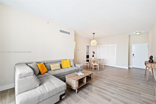 living room with hardwood / wood-style flooring