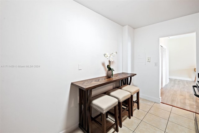 dining space featuring light hardwood / wood-style floors