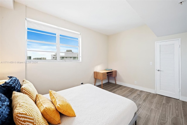 bedroom featuring hardwood / wood-style floors