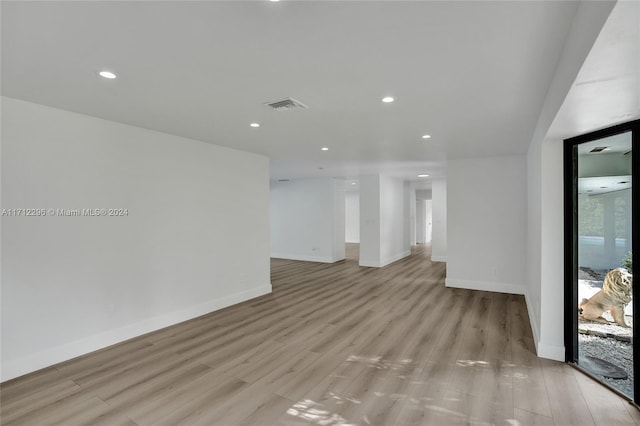 unfurnished living room featuring light hardwood / wood-style flooring