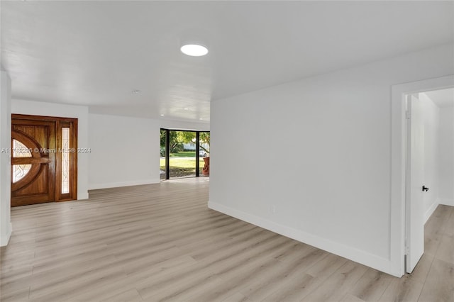 entryway with light hardwood / wood-style floors