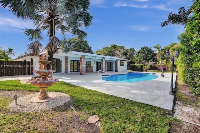 view of pool with a patio area