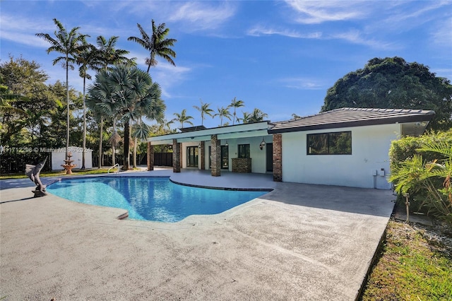 view of pool with a patio