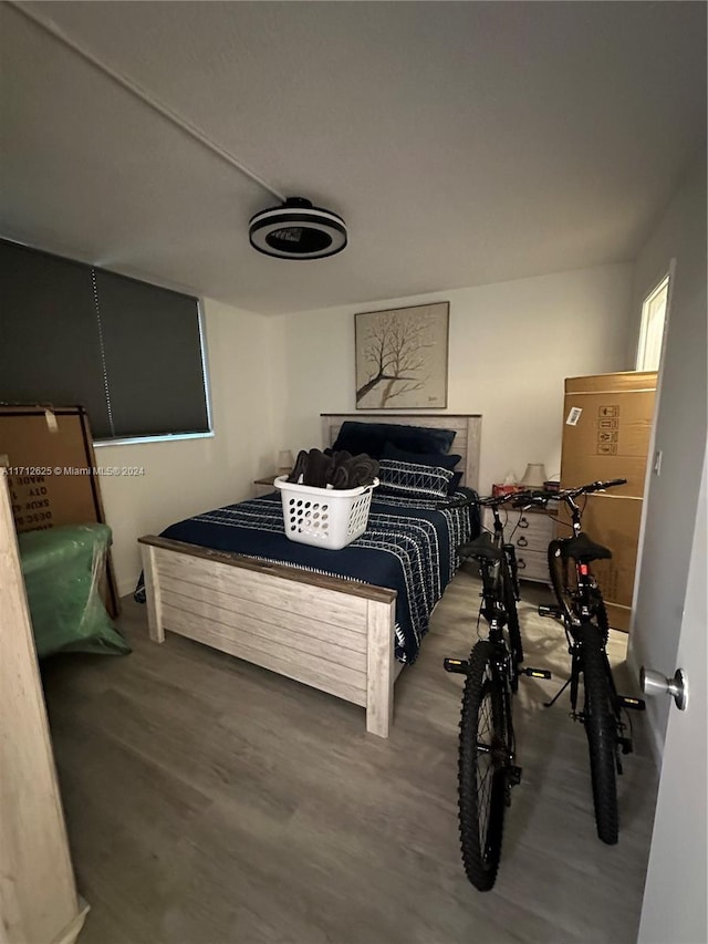 bedroom featuring hardwood / wood-style flooring