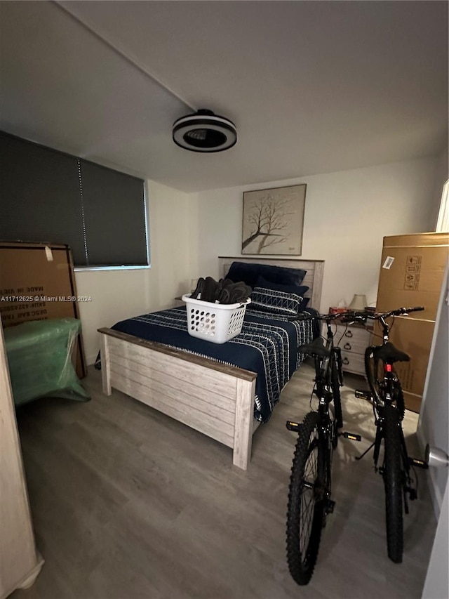 bedroom with wood-type flooring