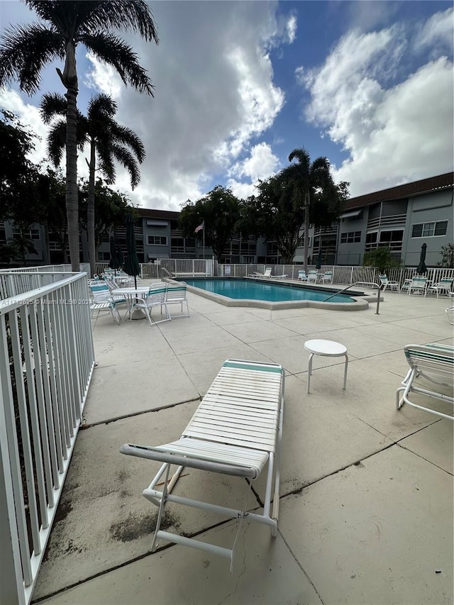 view of pool with a patio area