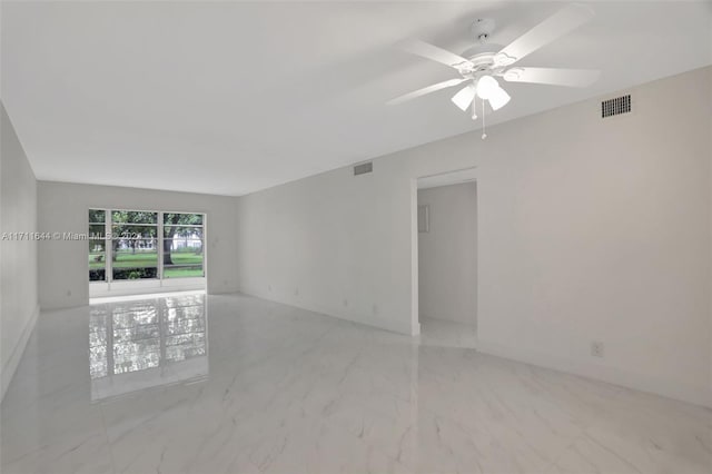 empty room featuring ceiling fan