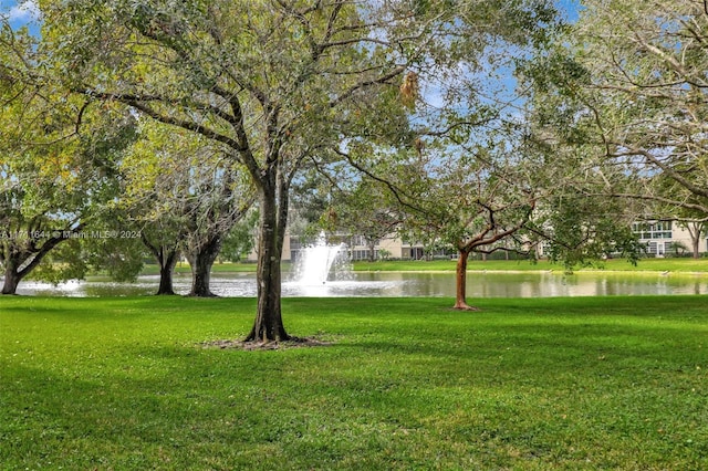 view of yard with a water view