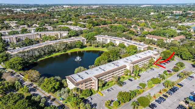 drone / aerial view with a water view