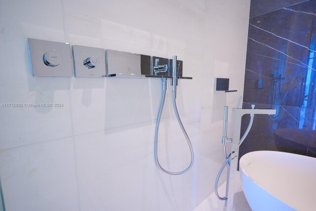 full bathroom with tile patterned flooring, vanity, separate shower and tub, and toilet