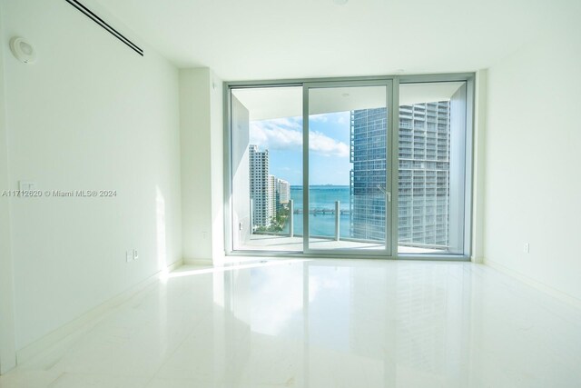 hallway with expansive windows