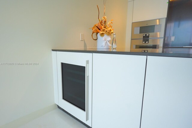 kitchen featuring white cabinetry