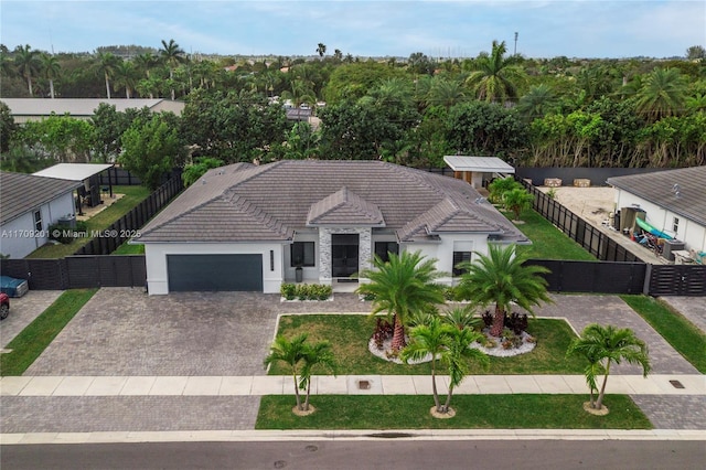 view of front of home with a garage