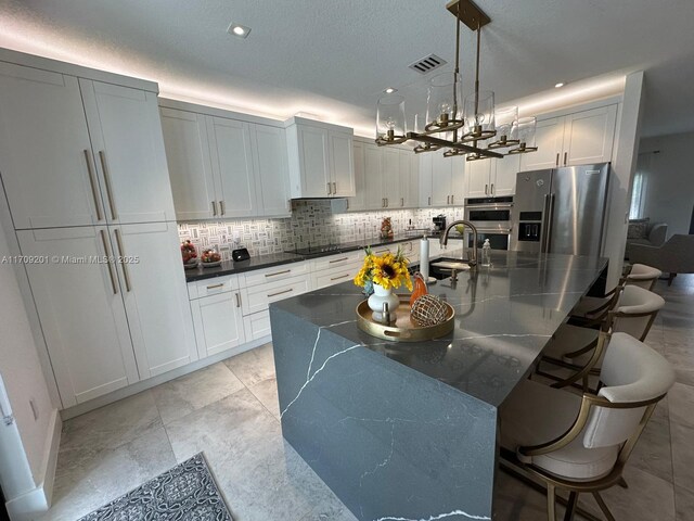 bar featuring white cabinetry, dishwasher, beverage cooler, and sink