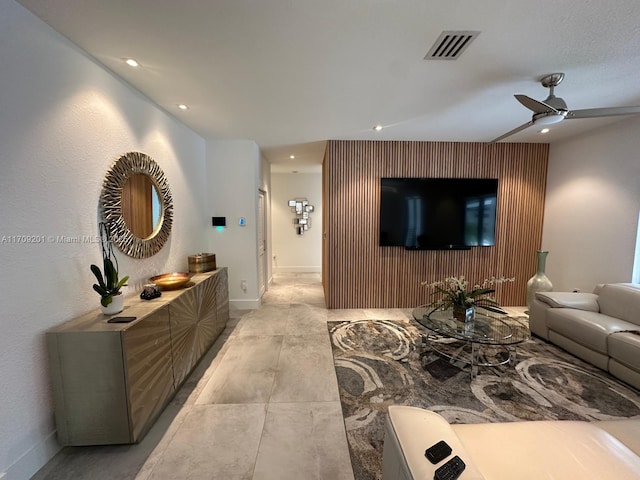 living room featuring ceiling fan