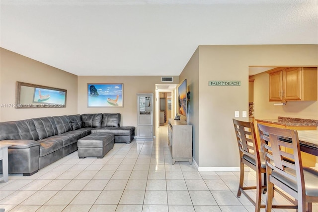 living room featuring light tile patterned floors