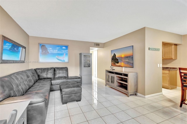 living room with light tile patterned floors