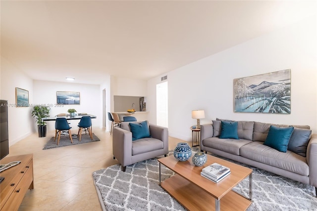 living room featuring tile patterned floors