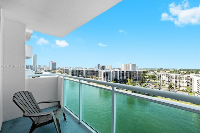 balcony featuring a water view