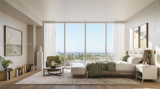 bedroom with expansive windows and hardwood / wood-style floors