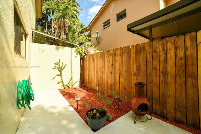 view of patio / terrace with a fireplace