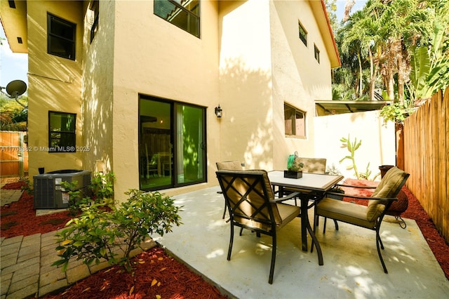 view of patio with central AC unit