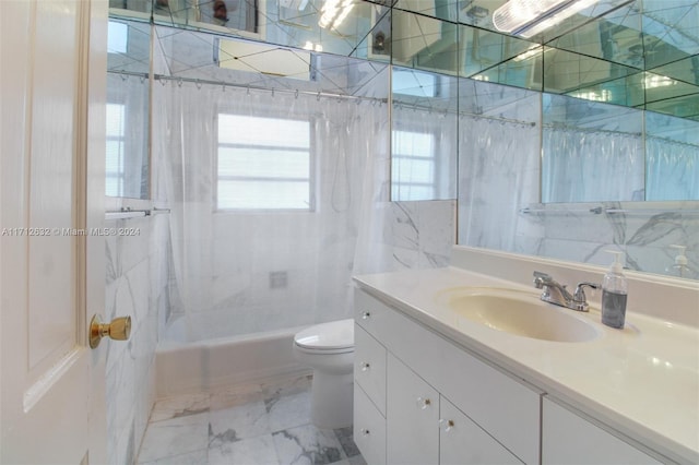 full bathroom with shower / bath combo, toilet, and vanity