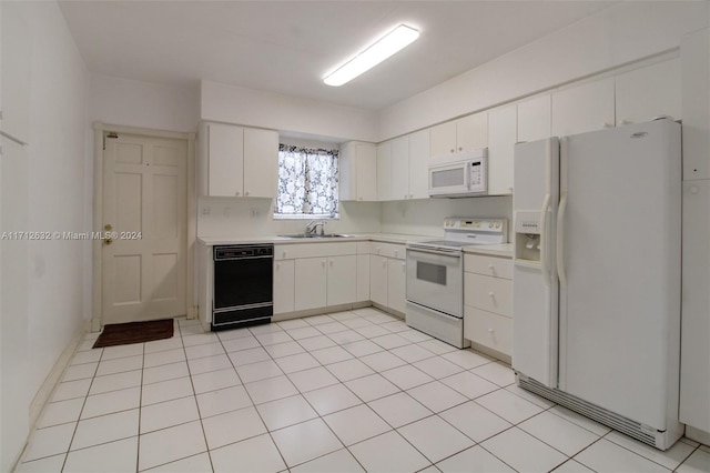 4241 Red Rd, Coral Gables, FL 33134 - kitchen with white appliances, light countertops, and white cabinetry