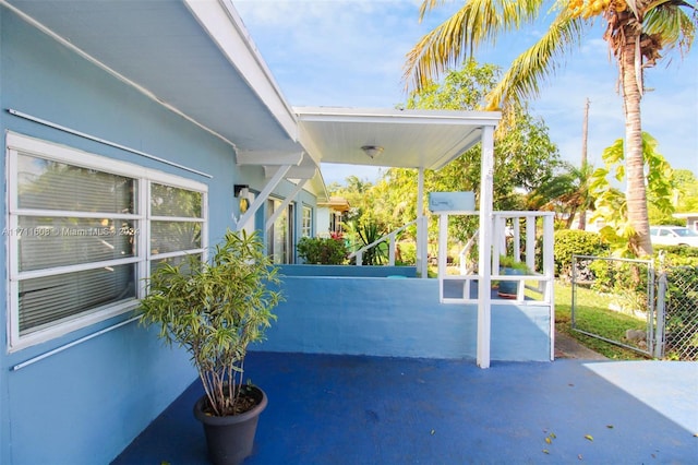 view of patio featuring a carport