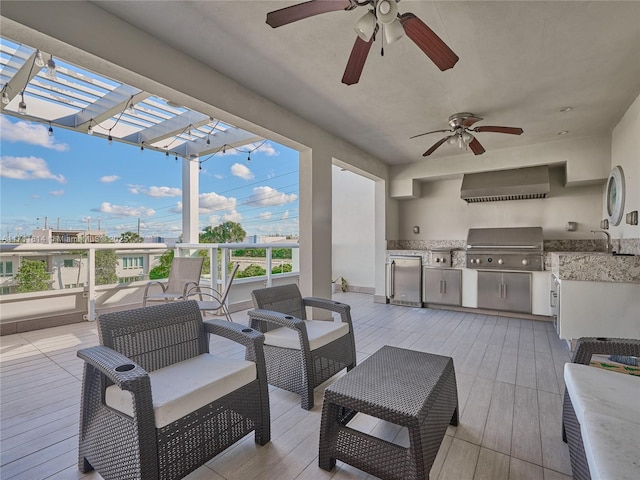 view of patio featuring a grill, area for grilling, ceiling fan, a pergola, and an outdoor living space