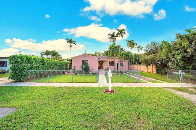 view of front of property with a front lawn