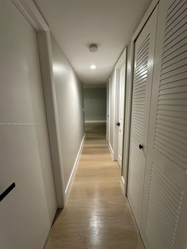 hallway featuring light hardwood / wood-style flooring