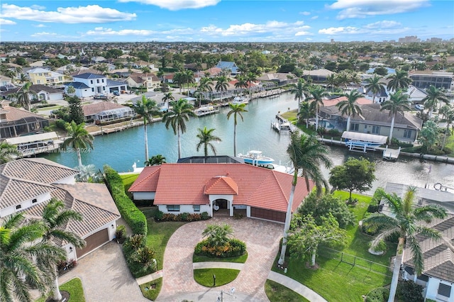 birds eye view of property featuring a water view