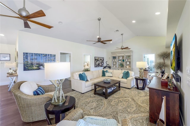 living room with hardwood / wood-style floors and lofted ceiling