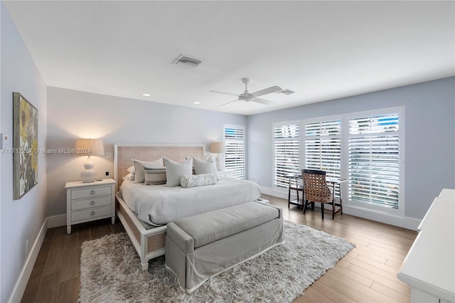 bedroom featuring ceiling fan and wood-type flooring