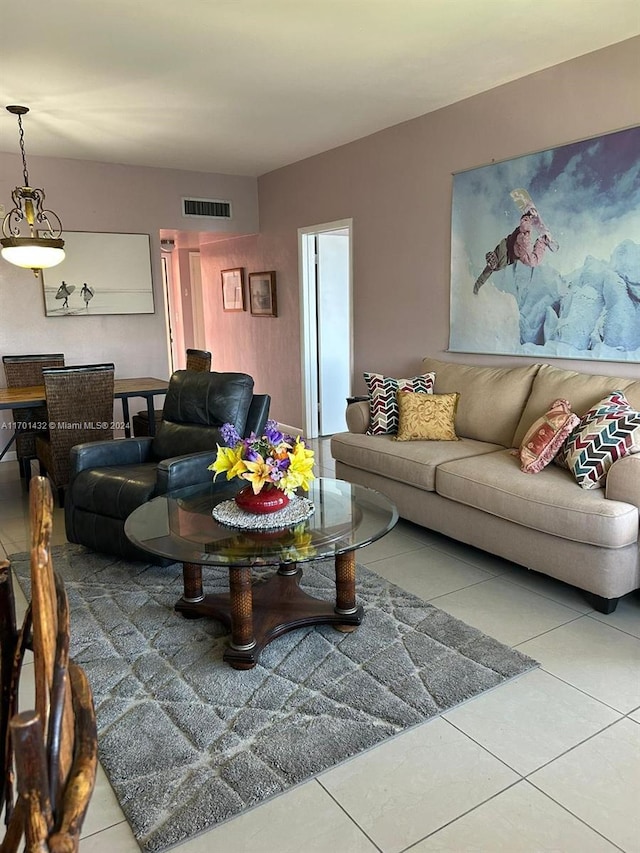 living room with tile patterned floors