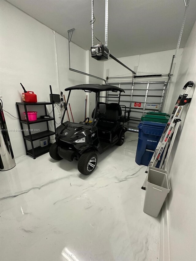 garage featuring a garage door opener