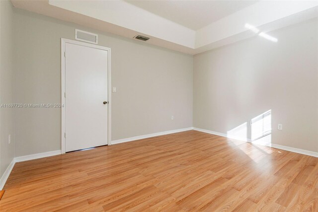 unfurnished room featuring light hardwood / wood-style flooring