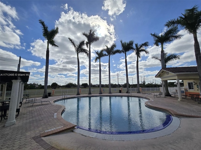 view of pool with a patio